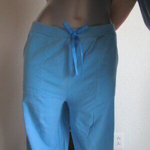 Light blue sweatpants with ribbon. Size LP, 14-16. Pockets front and back.